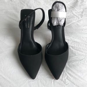 Brand new never worn Call it Spring black sling back heels.